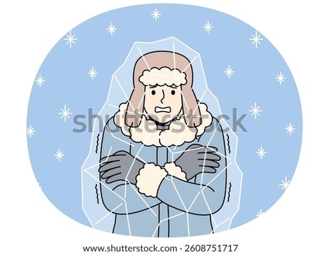 Frozen man stands inside block of ice and chatters teeth, suffering due to sudden climate change. Frozen guy in hat and winter jacket needs warm room and hot drink to avoid illness