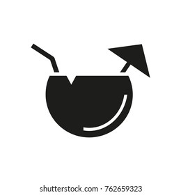 Fruit cocktail with umbrella and straw