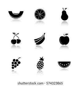 Fruit drop shadow black icons set. Melon slice, orange, pear, two cherries, bananas bundle, bunch of grapes, apple, pineapple, watermelon. Isolated vector illustrations