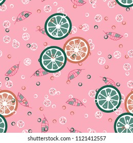 Fruit pattern with lemon and lime, ice cubes and mint leaves on a blue background. Stylish background with citrus for fabric, cover, plastic. Cold cocktail with lemon and lime. Freshness