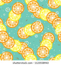 Fruit pattern with lemon and lime, ice cubes and mint leaves.