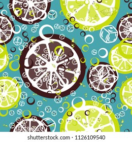 Fruit pattern with lemon and lime, ice cubes and mint leaves on a blue background. Cold cocktail with lemon. Freshness.