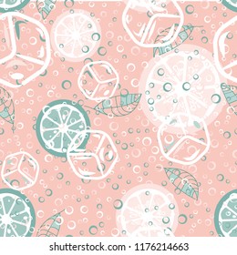 Fruit pattern with lemon and lime, ice cubes and mint leaves. Cold cocktail with lemon. Freshness.