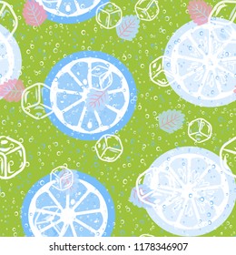 Fruit pattern with lemon and lime, ice cubes and mint leaves on a blue background. Cold cocktail with lemon. Freshness.