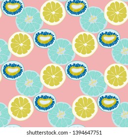 Fruit pattern with lemon and lime, ice cubes and mint leaves on a blue background. Cold cocktail with lemon. Freshness.