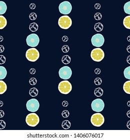 Fruit pattern with lemon and lime, ice cubes and mint leaves on a blue background. Cold cocktail with lemon. Freshness.