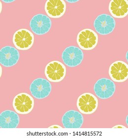 Fruit pattern with lemon and lime, ice cubes and mint leaves on a blue background. Cold cocktail with lemon. Freshness.