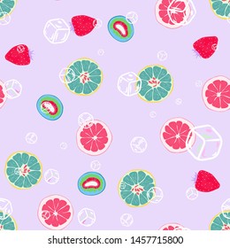 Fruit pattern with lemon and lime, ice cubes and mint leaves on a blue background. Cold cocktail with lemon. Freshness.