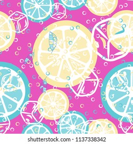 Fruit pattern with lemon and orange, ice cubes and mint leaves. Cold cocktail with lemon. Freshness.