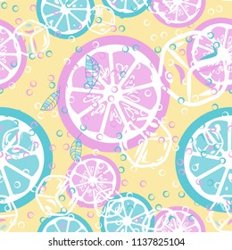 Fruit pattern with lemon and orange, ice cubes and mint leaves. Cold cocktail with lemon. Freshness.