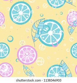 Fruit pattern with lemon and orange, ice cubes and mint leaves. Cold cocktail with lemon. Freshness.