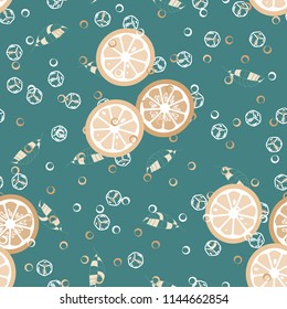 Fruit pattern with lemon and orange, ice cubes and mint leaves on a blue background. Cold cocktail with lemon. Freshness.