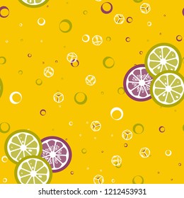 Fruit pattern with lemon and orange, ice cubes and mint leaves. Cold cocktail with lemon. Freshness.