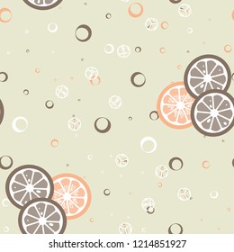 Fruit pattern with lemon and orange, ice cubes and mint leaves. Cold cocktail with lemon. Freshness.
