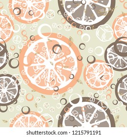 Fruit pattern with lemon and orange, ice cubes and mint leaves. Cold cocktail with lemon. Freshness.