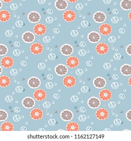 Fruit seamless pattern with orange and grapefruit. Fruit with ice. Cocktail pattern.