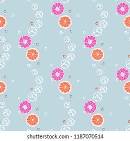 Fruit seamless pattern with orange and grapefruit. Fruit with ice. Cocktail pattern.