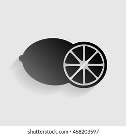 Fruits lemon sign. Black paper with shadow on gray background.