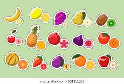 Fruits stickers on green background