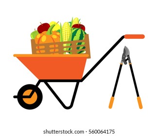 Fruits and vegetables in wheelbarrow vector illustration