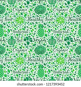 Fruit,vegetable seamless pattern.Healthy food,vegan,organic,bio handdrawn lettering.Eco,nature,detox,plant based weight loss concept.Broccoli,garnet,pea,lime,salad leaf EPS 10 vector background
