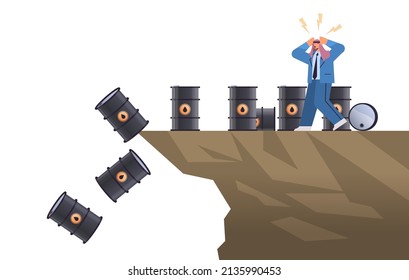frustrated arab businessman near oil barrels falling down in to deep abyss petrol market fuel price crisis concept
