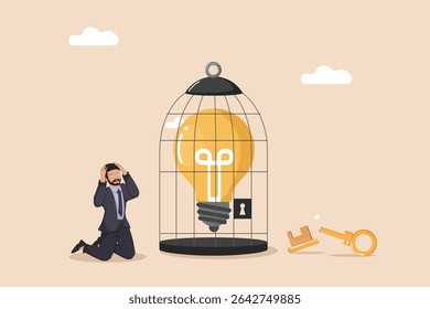 Empresário frustrado ajoelhado ao lado de uma lâmpada enjaulada e uma chave caída, ilustrando bloco criativo, falta de inspiração e a luta para desbloquear ideias inovadoras.