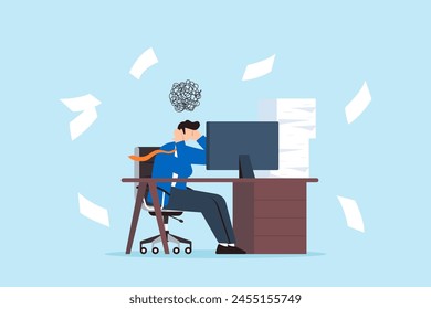 Frustrated businessman sits at his office desk with busy unfinished work, illustrating work stress. Concept of tiredness, fatigue from being overworked, and pressure to finish projects within deadline