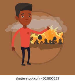 Frustrated man standing on the background of a big forest fire. Man pointing at forest fire. Concept of environmental destruction. Vector flat design illustration in the circle isolated on background.