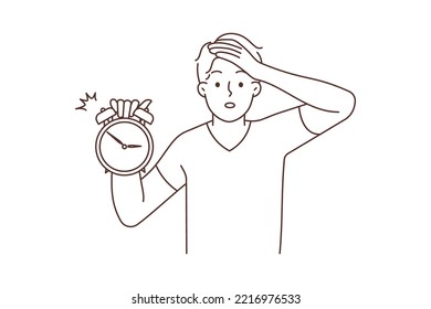 Frustrated young man hold clock show hour worried about missed deadline. Confused guy anxious about time clicking. Time management. Vector illustration. 