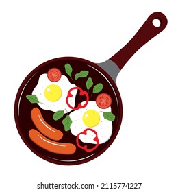 Frying pan with breakfast. Food in a pan. Eggs, peppers, sausages, tomatoes and spinach in a pan.