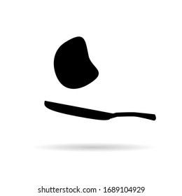 frying pan and pancake illustration in black