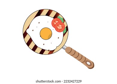 Frying pan with scrambled egg and tomato