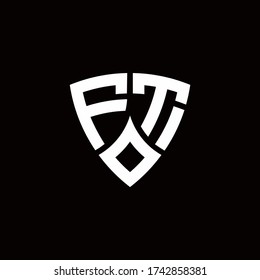 FT monogram logo with modern shield style design template isolated on black background