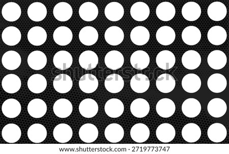 Full frame close-up of black and white polka dot fabric background.