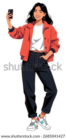 Full length happy young Asian woman taking selfie black smartphone wearing orange jacket white background