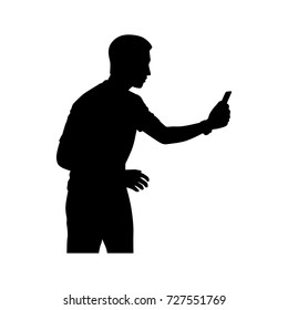 Full length of silhouette young man taking photo with smartphone against white background. Vector image
