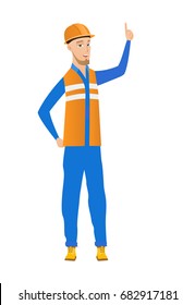 Full length of young caucasian builder in hard hat pointing his forefinger up. Excited builder with forefinger pointing up. Vector flat design illustration isolated on white background.