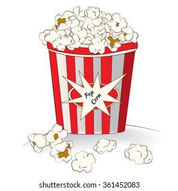 Full popcorn bucket with label and a few scattered popcorn slices. Colorful variant.