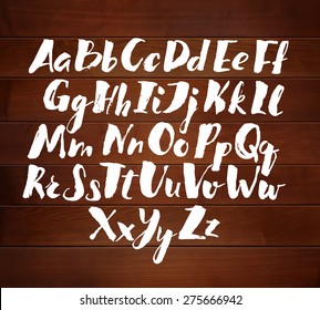 Full version hand drawn alphabet written with brush pen.