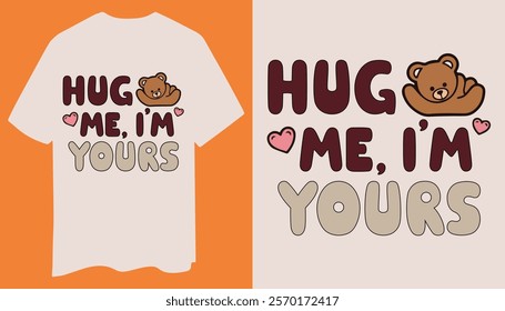 A fun, casual t-shirt with "Hug Me I'm Yours" bold text and a cute teddy bear, surrounded by playful heart graphics.