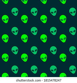 Fun green monochrome alien head seamless pattern vector art.	
