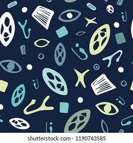 Fun hand drawn shapes in a multidirectional seamless vector pattern. Navy blue background, white, light green, aqua, turquoise. Modern and quirky- good for kids clothing, swimwear,