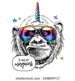 Fun Monkey in a rainbow glasses, with a unicorn horn and with a stars. I am so magical - lettering quote. Humor card, t-shirt composition, hand drawn style print. Vector illustration.