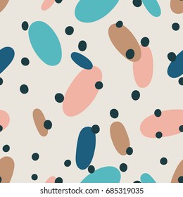 Fun seamless pattern with different elements. Multicolored texture with dots and ovals. Stylized confetti background.