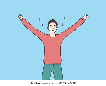 Fun, success, celebration, winner. Happy boy ro man with hands up.