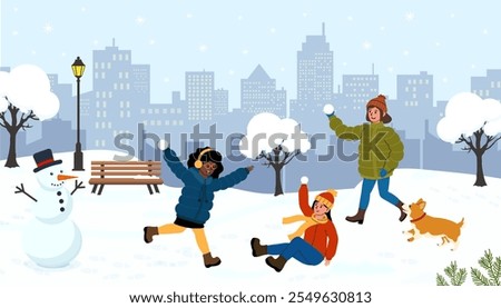 Fun winter day in the park with friends playing in the snow and building a snowman