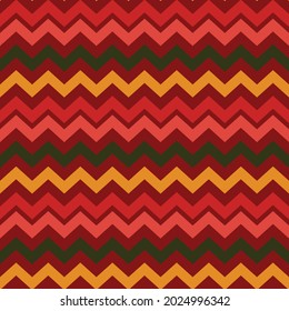 Funky 70's chevron seamless vector pattern. Groovy retro zig zag geometric abstract design in 1970's style. Maroon, Red, pink, green and yellow lines. Repeat background seventies wallpaper texture. 