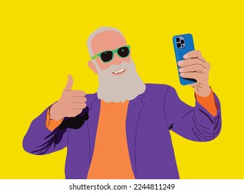 Funky, cool and stylish senior old man with fashionable clothes. An old man with white beard taking a selfie using a smartphone and giving a thumbs up