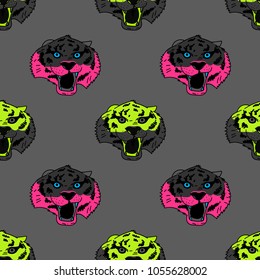 Funky tiger face seamless pattern. Original design for print or digital media.
